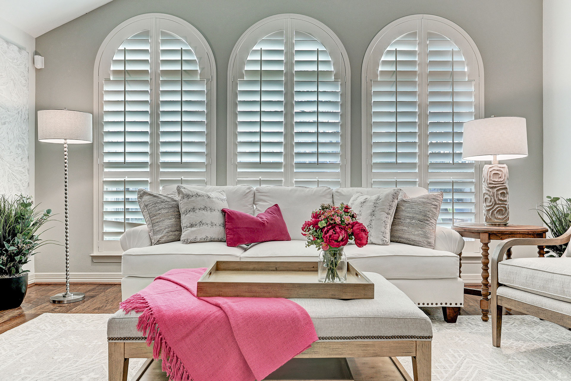 living room with pink throw