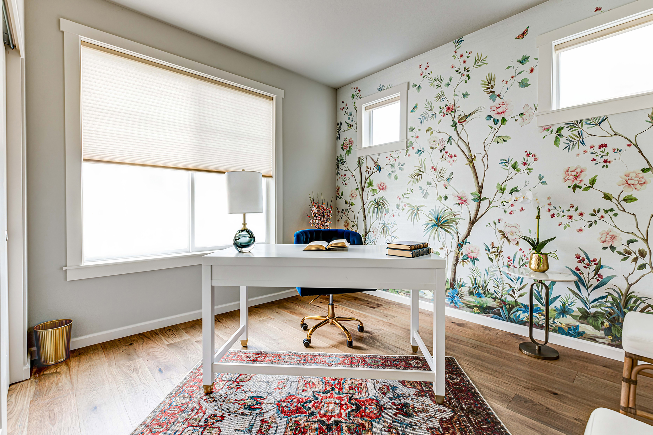 Home office with custom mural wallpaper designed in elevated Pacific Northwest interior style